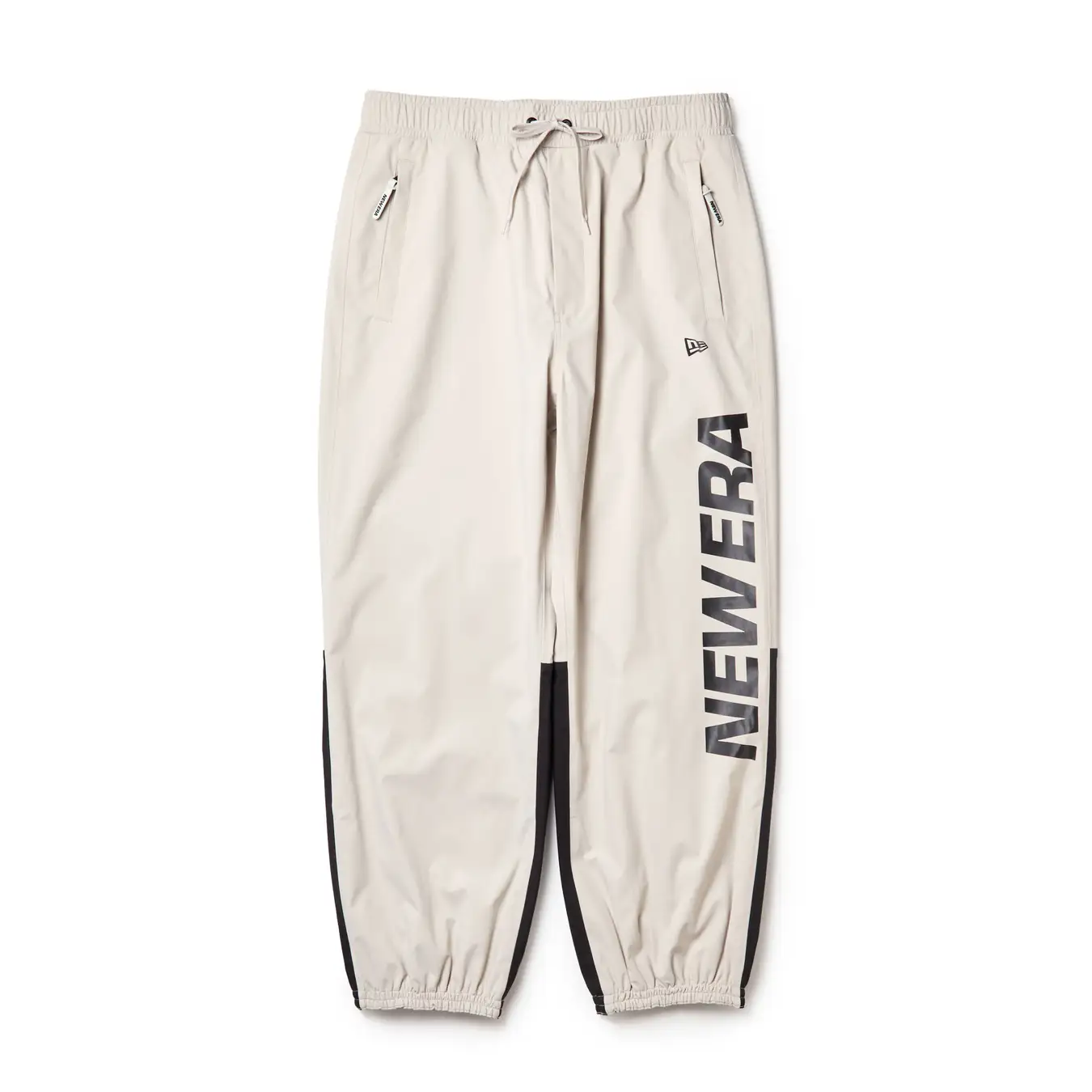 SNOW TRACK PANTS WORDMARKの白系パンツ